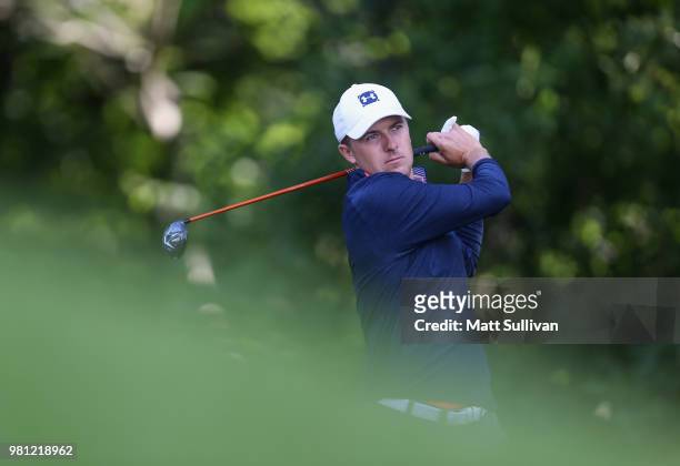 Jordan Spieth watches his tee shot on the 12th hole during the second round of the Travelers Championship at TPC River Highlands on June 22, 2018 in...