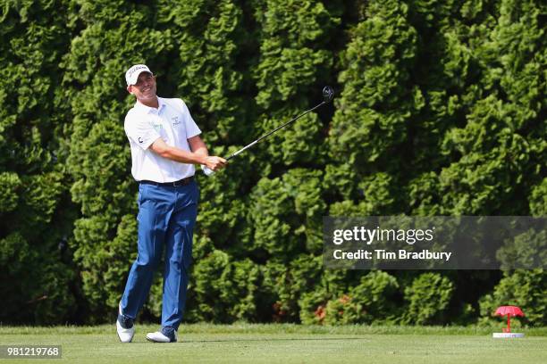 Bill Haas of the United States plays his shot from the ninth tee during the second round of the Travelers Championship at TPC River Highlands on June...