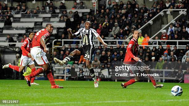 Shola Ameobi of Newcastle United scores the opening goal during the Coca Cola Championship match between Newcastle United and Nottingham Forest at St...