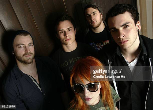 Rock band Paramore Jeremy Davis, Josh Farro, Hayley Williams, Zac Farro and Taylor York pose at a portrait session for The Los Angeles Times in...
