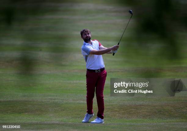 Daniel Clarke of Market Rasen and District Golf Club plays an approach shot on the 9th fairway during The Lombard Trophy Midlands Qualifier at...