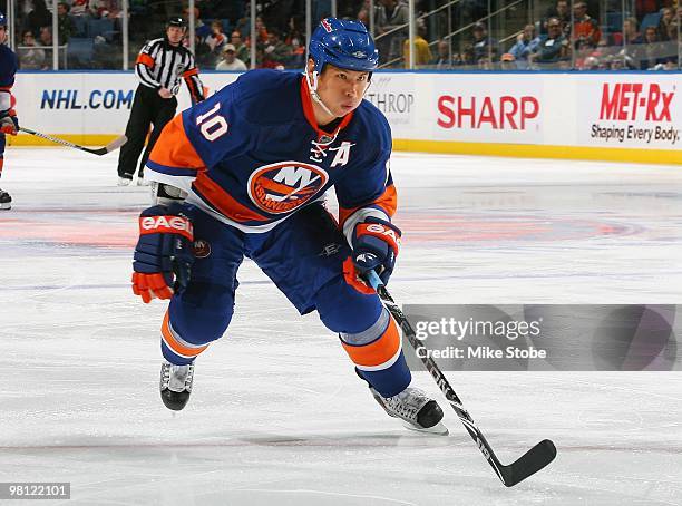 Richard Park of the New York Islanders skates against the New Jersey Devils on March 13, 2010 at Nassau Coliseum in Uniondale, New York. Islanders...