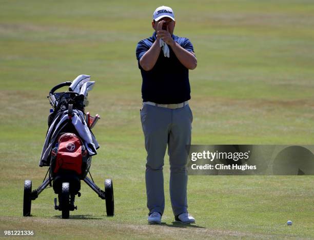 Edward Goodwin of Cirencester Golf Club checks the yardage on the 9th fairway during The Lombard Trophy Midlands Qualifier at Enville Golf Club on...