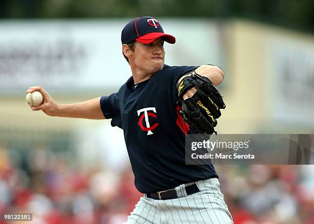 Pitcher Kevin Slowey of the Minnesota Twins throws against the St. Louis Cardinals at Roger Dean Stadium on March 29, 2010 in Jupiter, Florida.