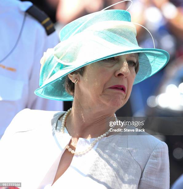 British Prime Minister Theresa May leaves after attending the Service of Thanksgiving to mark the 70th anniversary of the landing of the Empire...