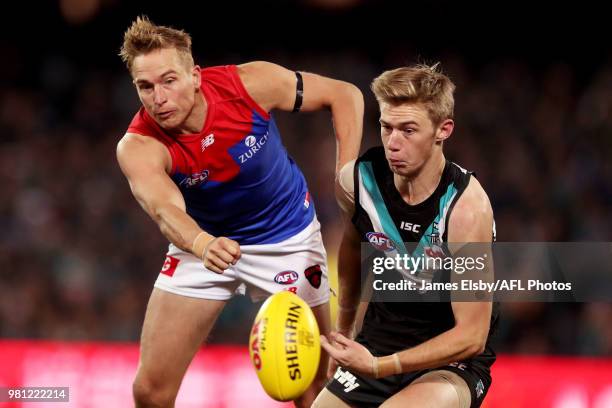 Bernie Vince of the Demons clashes with Todd Marshall of the Power during the 2018 AFL round 14 match between the Port Adelaide Power and the...