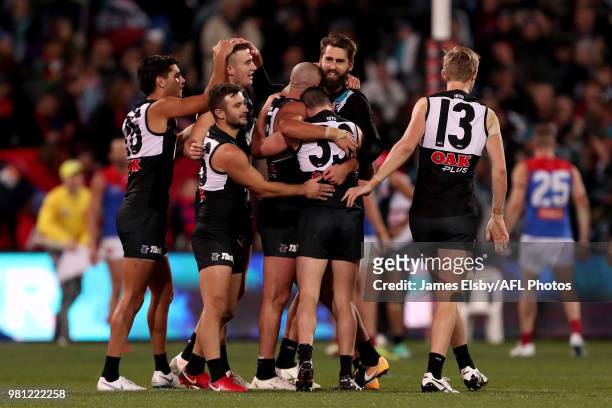 The Power celebrate their win during the 2018 AFL round 14 match between the Port Adelaide Power and the Melbourne Demons at Adelaide Oval on June...