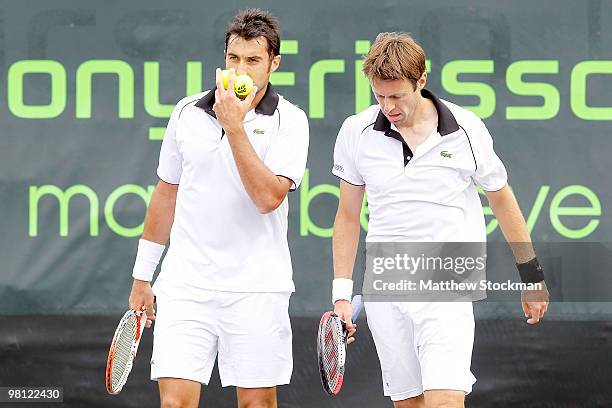 Nenad Zimonjic of Serbia and Daniel Nestor of Canada play against Nicolas Almagro and Tommy Roberdo of Spain during day seven of the 2010 Sony...