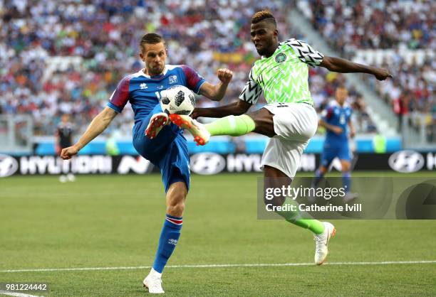 Gylfi Sigurdsson of Iceland is tackled ny Kelechi Iheanacho of Nigeria during the 2018 FIFA World Cup Russia group D match between Nigeria and...