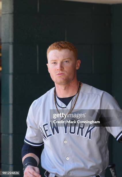 Clint Frazier of the New York Yankees looks on from the dugout during game one of a double header against the Detroit Tigers at Comerica Park on June...