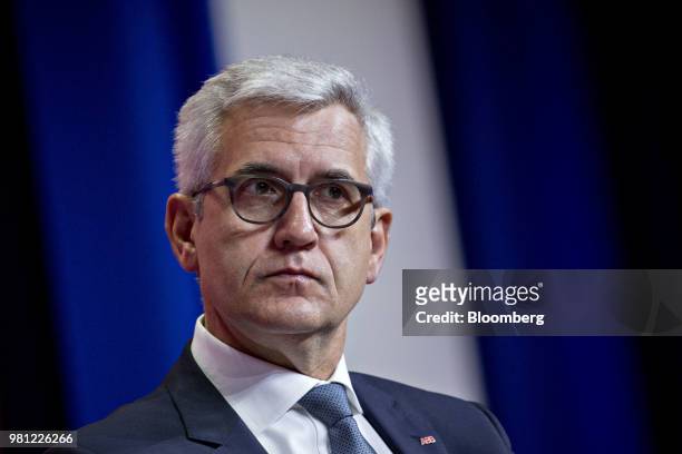 Ulrich Spiesshofer, chief executive officer of ABB Ltd., listens during a panel discussion at the SelectUSA Investment Summit in National Harbor,...