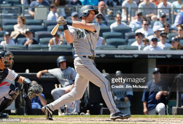 Andrew Romine of the Seattle Mariners follows through on a seventh inning single against the New York Yankees at Yankee Stadium on June 21, 2018 in...