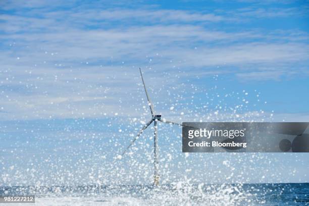 Wind turbines stand on the EDF Blyth Offshore Demonstrator wind farm, operated by EDF Energy Renewables Ltd., off the Northumberland coast in Blyth,...