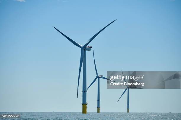 Wind turbines stand on the EDF Blyth Offshore Demonstrator wind farm, operated by EDF Energy Renewables Ltd., off the Northumberland coast in Blyth,...