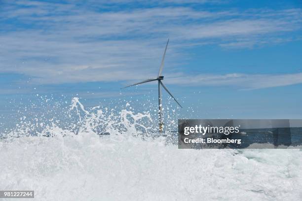 Wind turbines stand on the EDF Blyth Offshore Demonstrator wind farm, operated by EDF Energy Renewables Ltd., off the Northumberland coast in Blyth,...