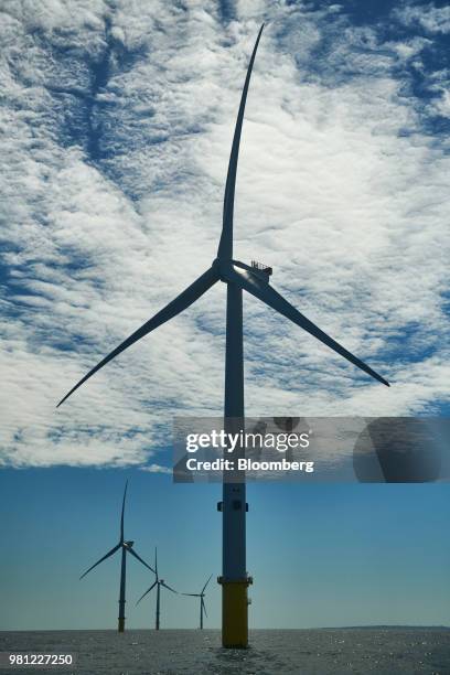 Wind turbines stand on the EDF Blyth Offshore Demonstrator wind farm, operated by EDF Energy Renewables Ltd., off the coast from Blyth,...