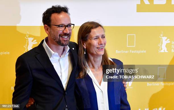 Former artistic director of the Swiss film festival of Locarno Italian Carlo Chatrian and Dutch Mariette Rissenbeek pose on June 22, 2018 in Berlin...