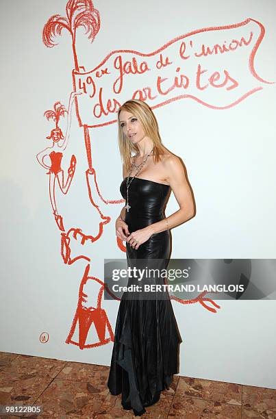 Actress Tonya Kinzinger poses as she arrives to attend the 49th edition of the "Gala de l'Union des Artistes", on March 29, 2010 at the Cirque...