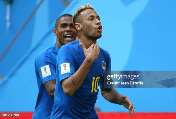 Neymar Jr of Brazil celebrates scoring the second goal of his team with Douglas Costa during the 2018 FIFA World Cup Russia group E match between...