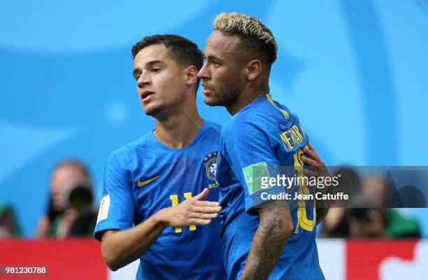 Neymar Jr of Brazil celebrates scoring the second goal of his team with Philippe Coutinho during the 2018 FIFA World Cup Russia group E match between...