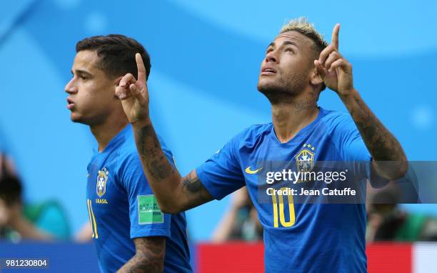 Neymar Jr of Brazil celebrates scoring the second goal of his team with Philippe Coutinho during the 2018 FIFA World Cup Russia group E match between...