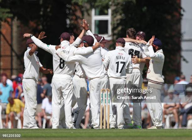 Surrey players celebrate after beating Somerset by an innings and 69 runs during day 3 of the Specsavers County Championship Division One match...