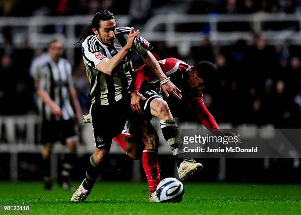 Gareth McCleary of Nottingham Forest battles with Jonas Gutierrez of Newcastle United during the Coca-Cola Championship match between Newcastle...