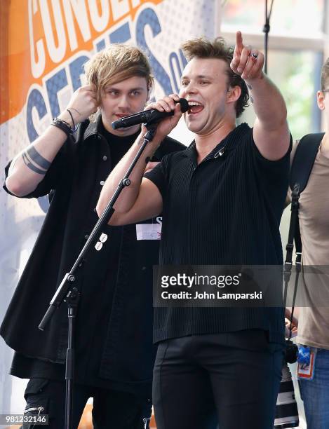 Michael Clifford and Ashton Irwin of 5 Seconds of Summer perform on NBC's "Today" at Rockefeller Plaza on June 22, 2018 in New York City.