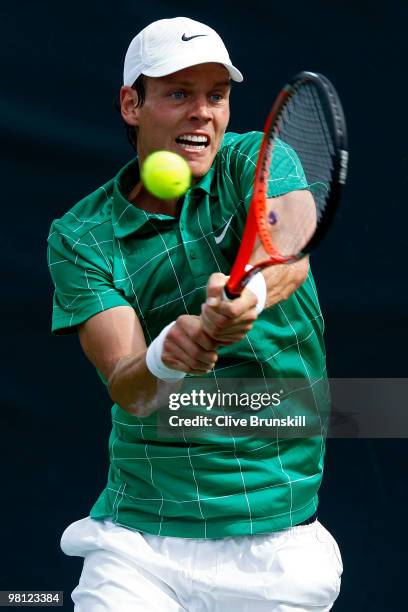 Tomas Berdych of the Czech Republic returns a shot against Horacio Zeballos of Argentina during day seven of the 2010 Sony Ericsson Open at Crandon...