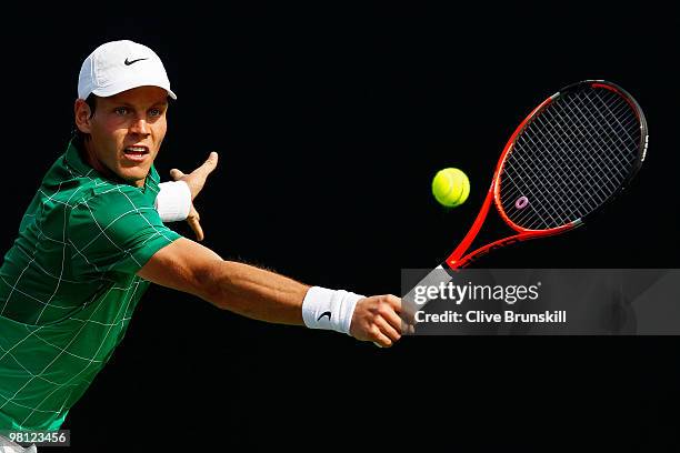 Tomas Berdych of the Czech Republic returns a shot against Horacio Zeballos of Argentina during day seven of the 2010 Sony Ericsson Open at Crandon...