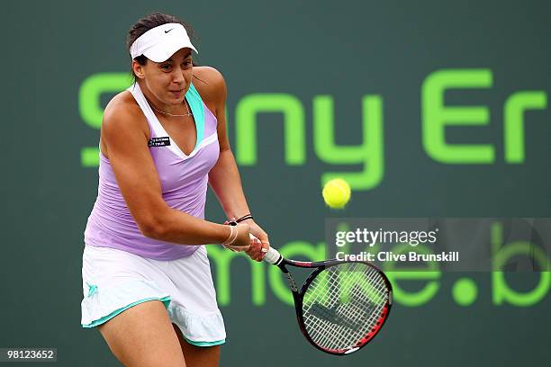 Marion Bartoli of France returns a shot against Svetlana Kuznetsova of Russia during day seven of the 2010 Sony Ericsson Open at Crandon Park Tennis...