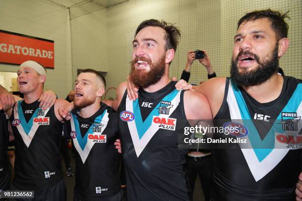 Port Adelaide Power players sing the clu song after during the round 14 AFL match between the Port Adelaide Power and the Melbourne Demons at...