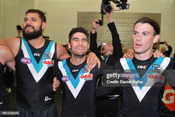 Port Adelaide Power players sing the clu song after during the round 14 AFL match between the Port Adelaide Power and the Melbourne Demons at...