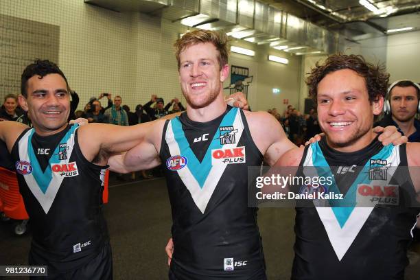 Port Adelaide Power players sing the clu song after during the round 14 AFL match between the Port Adelaide Power and the Melbourne Demons at...