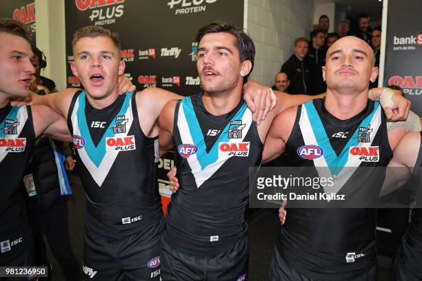 Port Adelaide Power players sing the clu song after during the round 14 AFL match between the Port Adelaide Power and the Melbourne Demons at...