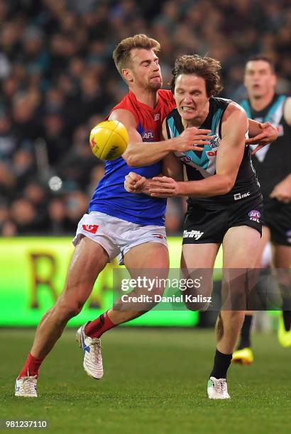 Jared Polec of the Power handballs during the round 14 AFL match between the Port Adelaide Power and the Melbourne Demons at Adelaide Oval on June...