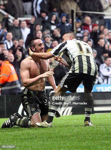 Danny Simpson congratulates Jose Enrique of Newcastle United after scoring the second goal during the Coca Cola Championship match between Newcastle...