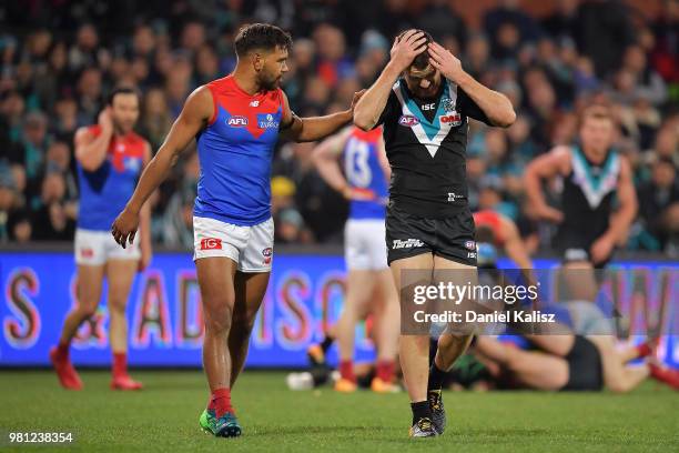 Neville Jetta of the Demons and Robbie Gray of the Power are pictured during the round 14 AFL match between the Port Adelaide Power and the Melbourne...