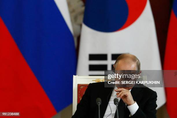 Russian President Vladimir Putin attends a joint news conference with South Korean President Moon Jae-in following the talks at the Kremlin in...