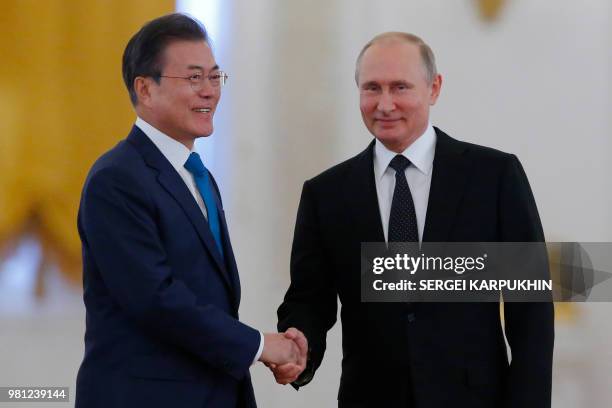 Russian President Vladimir Putin and South Korean President Moon Jae-in attend a welcoming ceremony at the Kremlin in Moscow, Russia on June 22, 2018.