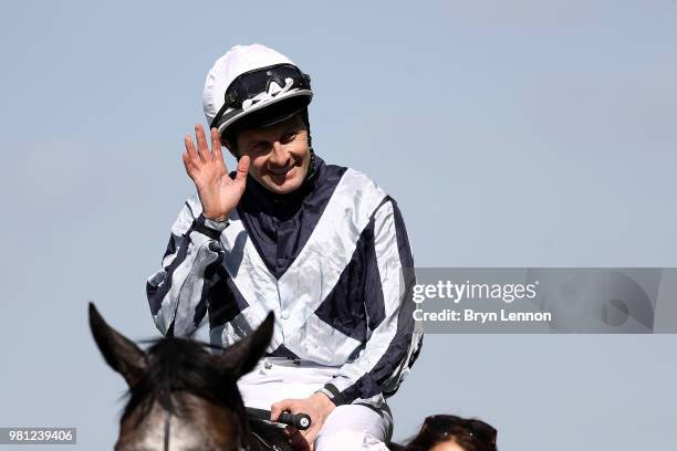 Colm O'Donoghue riding Alpha Centaur acknowledges the crowd after winning The Coronation Stakes on day 4 of Royal Ascot at Ascot Racecourse on June...