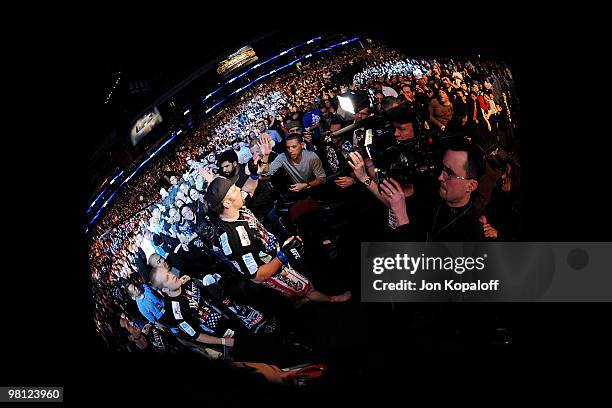 Fighter Shane Carwin shakes hands with a fan before facing Frank Mir during their "Interim" Heavyweight title bout at UFC 111 at the Prudential...