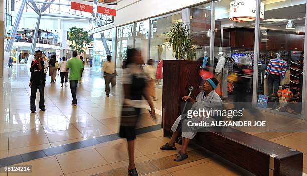 Soweto residents shop at Maponya Mall in Soweto on March 19, 2010 This is the new Soweto, a mix of upper-crust comforts and urban grit, where...