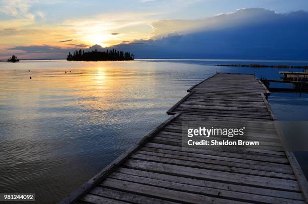 sunset over lake, deschambault lake, regina, saskatchewan, canada - regina saskatchewan stock pictures, royalty-free photos & images