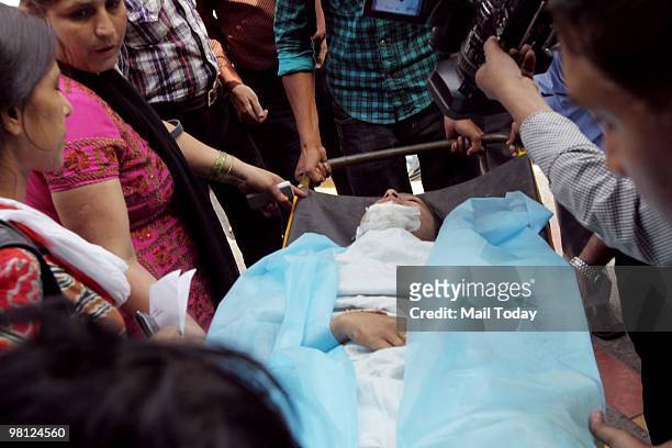 Delhi Metro mishap victim Mehjabin, who lost a leg in a Delhi metro accident, is bought to the RML hispital in New Delhi on March 27, 2010.