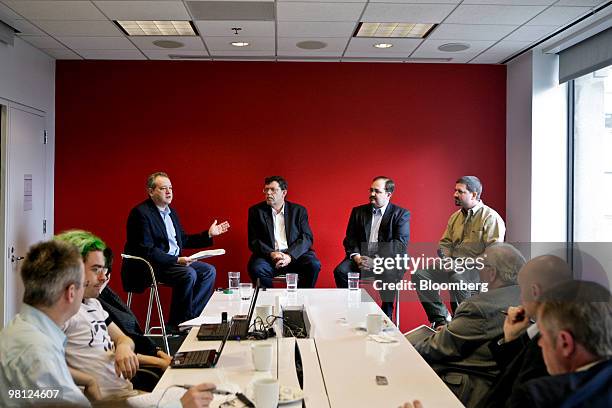 Nigel Dessau, senior vice president and chief marketing officer of Advanced Micro Devices Inc. , far left, discusses AMD's new 6000 series Opteron...