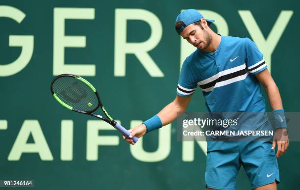 Karen Khachanov from Russia reacts during his match against Roberto Bautista Agut from Spain at the ATP Gerry Weber Open tennis tournament in Halle,...