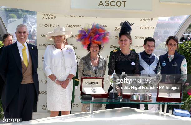 Prince Andrew, Duke of York presents the trophies to Jockey Colm O'Donoghue, trainer Jessica Harrington and owners the Niarchos Family after winning...
