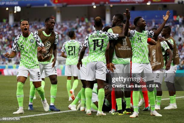 Ahmed Musa of Nigeria celebrates with teammates after scoring his team's first goal during the 2018 FIFA World Cup Russia group D match between...