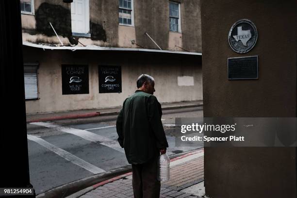 Man walks through downtown Brownsville, a border city which has become dependent on the daily crossing into and out of Mexico on June 22, 2018 in...